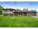 Charming two-story home features a welcoming front porch and an attached two car garage at 5631 N Olivia Dr, Alexandria, IN 46001