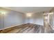 Spacious living room featuring modern flooring and neutral paint, ready for personalization at 5806 E 19Th St, Indianapolis, IN 46218