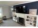 Stylish living room featuring a brick fireplace and built-in shelves at 5889 Crestview Ave, Indianapolis, IN 46220