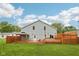 Expansive backyard featuring a large deck and gazebo, perfect for outdoor entertaining at 604 Alexandria Pike, Anderson, IN 46012