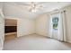 Cozy bedroom with a ceiling fan, window, and chalk board paint accent wall at 604 Alexandria Pike, Anderson, IN 46012
