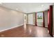 Inviting living room with hardwood floors, recessed lighting, and natural light, perfect for relaxing and entertaining guests at 604 Alexandria Pike, Anderson, IN 46012