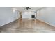 Expansive living room offers modern flooring, a fireplace, recessed lights and ample space for furniture arrangement at 604 Alexandria Pike, Anderson, IN 46012