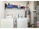 Functional laundry room with washer, dryer, and ample storage space at 6553 Black Antler Dr, Indianapolis, IN 46217