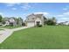 Beautiful two-story home with a well-manicured front yard, a driveway, and a welcoming exterior at 6917 Wolf Creek Ct, Whitestown, IN 46075