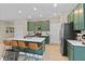 Bright, modern kitchen featuring a central island, stainless steel appliances, and ample counter space at 6917 Wolf Creek Ct, Whitestown, IN 46075