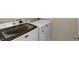 Modern laundry room showcasing a white Maytag washer and dryer set for convenient chores at 6917 Wolf Creek Ct, Whitestown, IN 46075