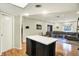 Bright kitchen island flows into open-concept living space with seamless access to a living room at 741 Fairway Dr, Indianapolis, IN 46260