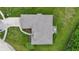 Aerial view of the house roof and the flower bed on a well maintained lawn at 7521 Kilbarron Cir, Indianapolis, IN 46217