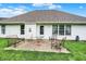 Charming backyard patio with outdoor seating, perfect for relaxing or entertaining guests at 7521 Kilbarron Cir, Indianapolis, IN 46217