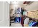 Organized walk-in closet with ample shelving and hanging space for clothing storage at 7521 Kilbarron Cir, Indianapolis, IN 46217