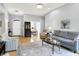 Spacious living room with hardwood floors, neutral paint, and comfortable seating arrangement at 7521 Kilbarron Cir, Indianapolis, IN 46217