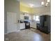 Bright kitchen features tile floors and modern appliances, perfect for cooking and dining at 7724 Blackthorn Dr, Indianapolis, IN 46236