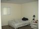Simple bedroom with neutral walls and a cozy carpet at 80 Brentwood Dr, Mooresville, IN 46158