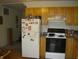 Functional kitchen with appliances and cabinets, offering ample storage space at 80 Brentwood Dr, Mooresville, IN 46158