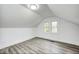 Bright bedroom showcasing modern floors, neutral walls, and double window at 805 N Euclid Ave, Indianapolis, IN 46201
