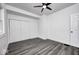 Bright bedroom with laminate flooring, closet, and neutral decor for a cozy feel at 805 N Euclid Ave, Indianapolis, IN 46201