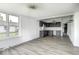 Open concept living room with gray tone flooring and lots of natural light at 805 N Euclid Ave, Indianapolis, IN 46201
