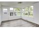 Bright and airy sun room with expansive windows, perfect for relaxation and entertaining at 805 N Euclid Ave, Indianapolis, IN 46201