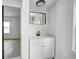 Modern bathroom featuring a new vanity with a black faucet and an updated mirror at 815 E 24Th E St, Indianapolis, IN 46205