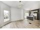 Spacious living room and kitchen area with modern lighting and hardwood floors at 815 E 24Th E St, Indianapolis, IN 46205