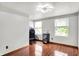 Bright bedroom with hardwood floors and two windows at 8272 Calgary Ct, Indianapolis, IN 46268