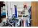 Walk-in closet provides ample storage with shelving and rods at 8272 Calgary Ct, Indianapolis, IN 46268
