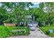 Charming two-story home with a well-manicured lawn, mature trees, and a two-car garage at 8272 Calgary Ct, Indianapolis, IN 46268