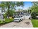 Charming home with a driveway, two-car garage, and well-manicured front lawn at 8272 Calgary Ct, Indianapolis, IN 46268
