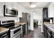 Close up of a kitchen with stainless steel appliances and plenty of cabinet space at 8272 Calgary Ct, Indianapolis, IN 46268