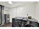 Laundry room with gray water heater, duct work, and black Samsung washing machine and dryer at 8272 Calgary Ct, Indianapolis, IN 46268