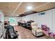 Spacious basement area with light walls, wooden ceiling, and recreation area at 8301 E County Road 801 S, Plainfield, IN 46168