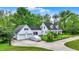 Charming two-story home with a well-manicured front yard and 2-car garage at 8301 E County Road 801 S, Plainfield, IN 46168