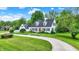 Charming two-story home with a well-manicured front yard at 8301 E County Road 801 S, Plainfield, IN 46168