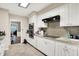 Charming kitchen with white cabinets, granite countertops, and stainless steel double oven at 8301 E County Road 801 S, Plainfield, IN 46168
