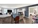 Cozy living room featuring a fireplace, dark wood floors, and neutral color palette at 8301 E County Road 801 S, Plainfield, IN 46168