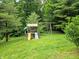 Backyard with trees, playset and swing set at 8310 Dog Trot Ln, Morgantown, IN 46160