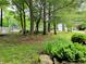 Lush landscaping and a white picket fence enhance the outdoor appeal of this home at 8310 Dog Trot Ln, Morgantown, IN 46160