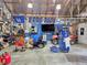 Well-lit garage with space for a workshop and storing recreational vehicles at 8310 Dog Trot Ln, Morgantown, IN 46160
