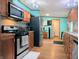 Well-lit kitchen featuring stainless steel appliances and warm wood cabinetry at 8310 Dog Trot Ln, Morgantown, IN 46160