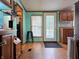 Kitchen featuring stainless refrigerator, wood cabinetry, and eat in dining at 8310 Dog Trot Ln, Morgantown, IN 46160