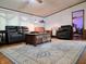 Comfortable living room showcasing modern furniture and stylish rug at 8310 Dog Trot Ln, Morgantown, IN 46160