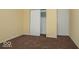 Bedroom with carpet, a closet, and neutral walls at 8361 Paso Del Norte Ct, Indianapolis, IN 46227