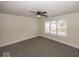 Inviting bedroom with plush carpeting, ceiling fan and natural light from a large window at 839 N Oxford St, Indianapolis, IN 46201