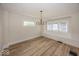 Bright dining area featuring wood floors, updated lighting, and neutral paint at 839 N Oxford St, Indianapolis, IN 46201