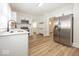 Bright kitchen featuring stainless steel appliances, quartz countertops, and hardwood floors at 839 N Oxford St, Indianapolis, IN 46201