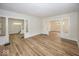 Spacious living room featuring wood floors, columns, and neutral paint at 839 N Oxford St, Indianapolis, IN 46201