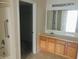 Bathroom featuring a vanity, mirror, shower, and a walk-in closet at 855 Gazebo Way # C, Greenwood, IN 46142