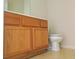 Bathroom featuring wooden vanity and toilet at 855 Gazebo Way # C, Greenwood, IN 46142