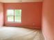 Bedroom with carpet and large window at 855 Gazebo Way # C, Greenwood, IN 46142
